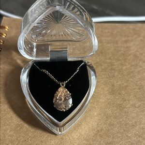gold-tone‎ chain necklace featuring a pear-shaped crystal pendant, Swarovski